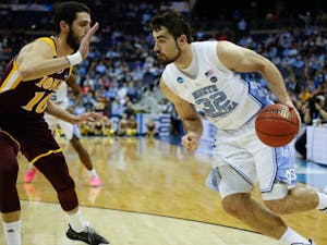 Senior forward Luke Maye (32) drives past Iona player on Friday, March 22, 2019 during the first round of the NCAA Championship at Nationwide Arena in Columbus, Ohio.