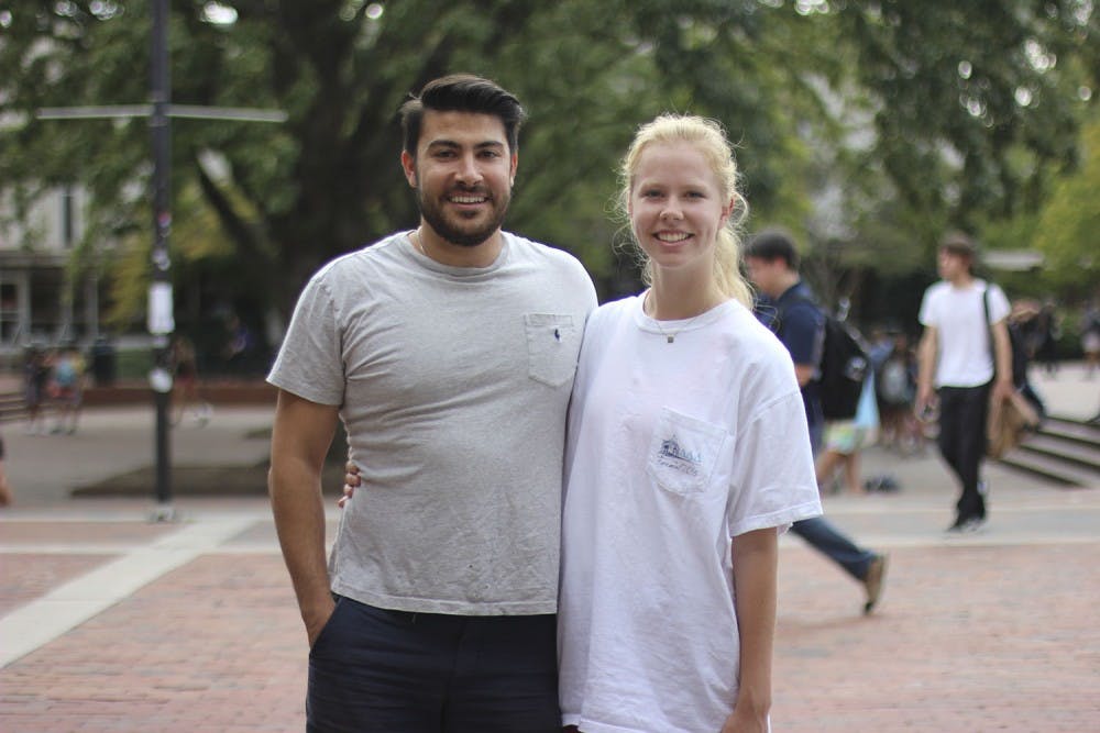 Arteen Asgharzadeh (left), the Growth Leader for JoyRun, and Savanna Michaux, JoyRun's Student Leader on campus, stand together in the pit. 