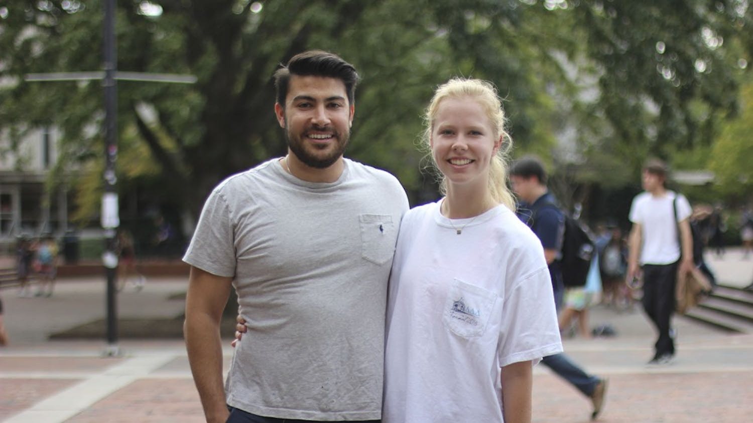 Arteen Asgharzadeh (left), the Growth Leader for JoyRun, and Savanna Michaux, JoyRun's Student Leader on campus, stand together in the pit. 