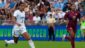 UNC junior forward Sam Meza (1) dribbles the ball during the women's soccer 1-2 loss in the ACC Finals against FSU at WakeMed Soccer Park on Sunday, Nov. 6, 2022.