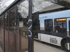 Rust, graffiti and debris plague the bus stop across from Fraternity Court on Tuesday, Jan. 29, 2019. Bus stops all around the town of Chapel Hill have been victims of neglect and signs have begun to show.