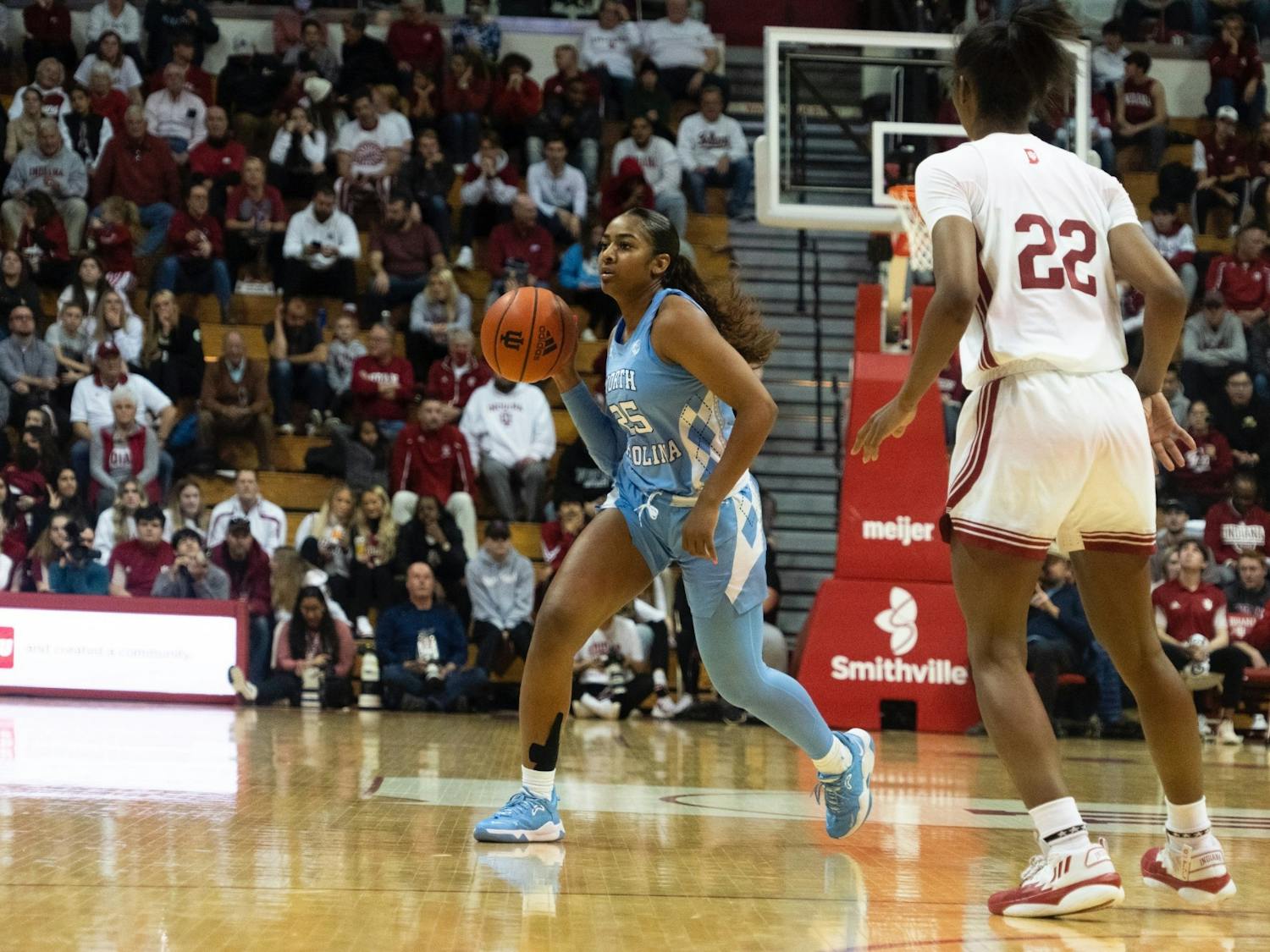 Junior guard, Deja Kelly (25) dribbles the ball at the Simon Skjodt Assembly Hall at Indiana University on Thursday, December 1, 2022. UNC lost 87-63. Photo Courtesy of UNC Athletic Communications