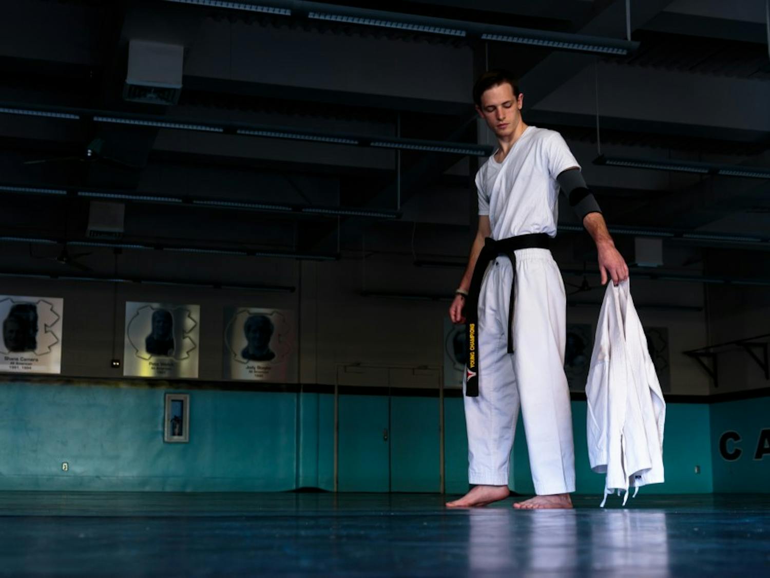 Senoir psychology and peace, war, and defense major Brandon Kelly grew averted to martial arts after his injured elbow cost him his judo match at the olympic trials. His experience studying abroad helped him find catharsis.