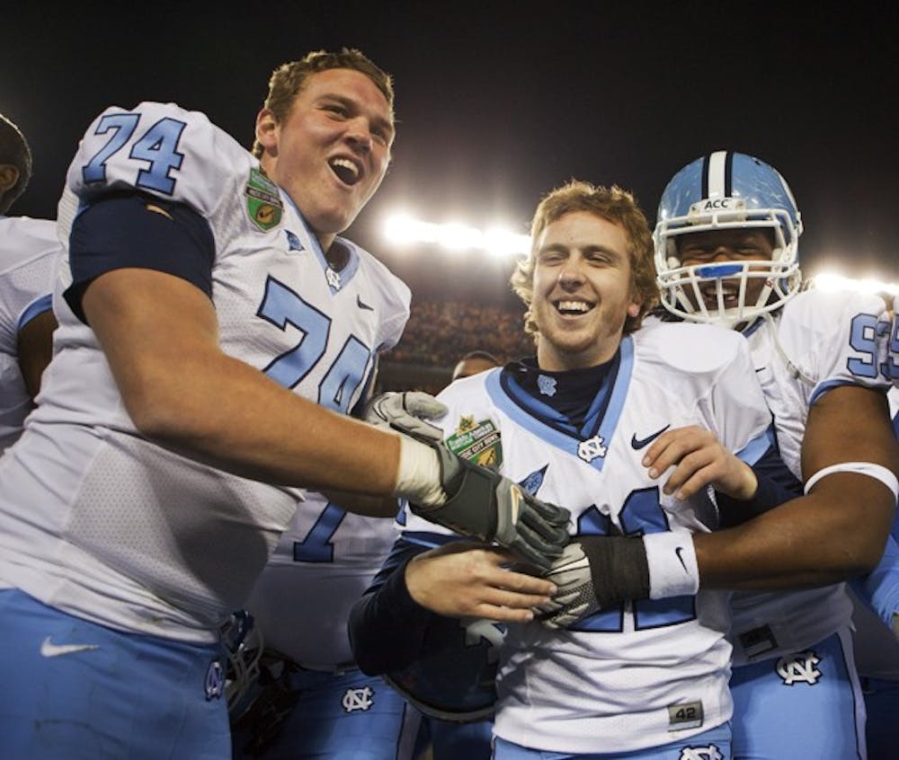 Casey Barth is all smiles after his game-winning field goal gave UNC a 30-27 victory against Tennessee in the Music City Bowl in Nashville.