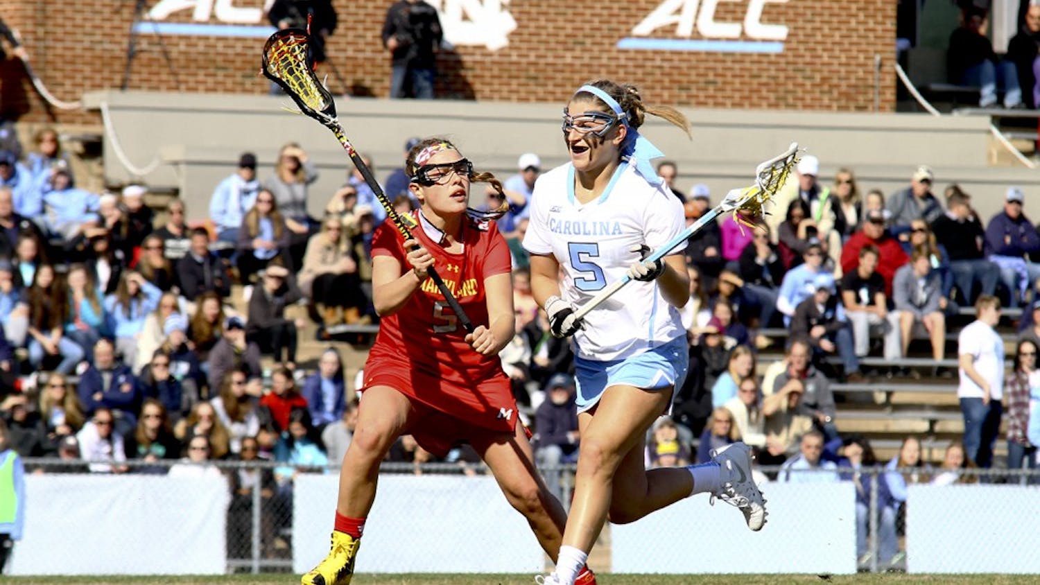 Olivi Ferrucci (5) runs past a Maryland defender Saturday afternoon. Ferrucci had two goals in the Tar Heels loss to the Maryland Terrapins. 