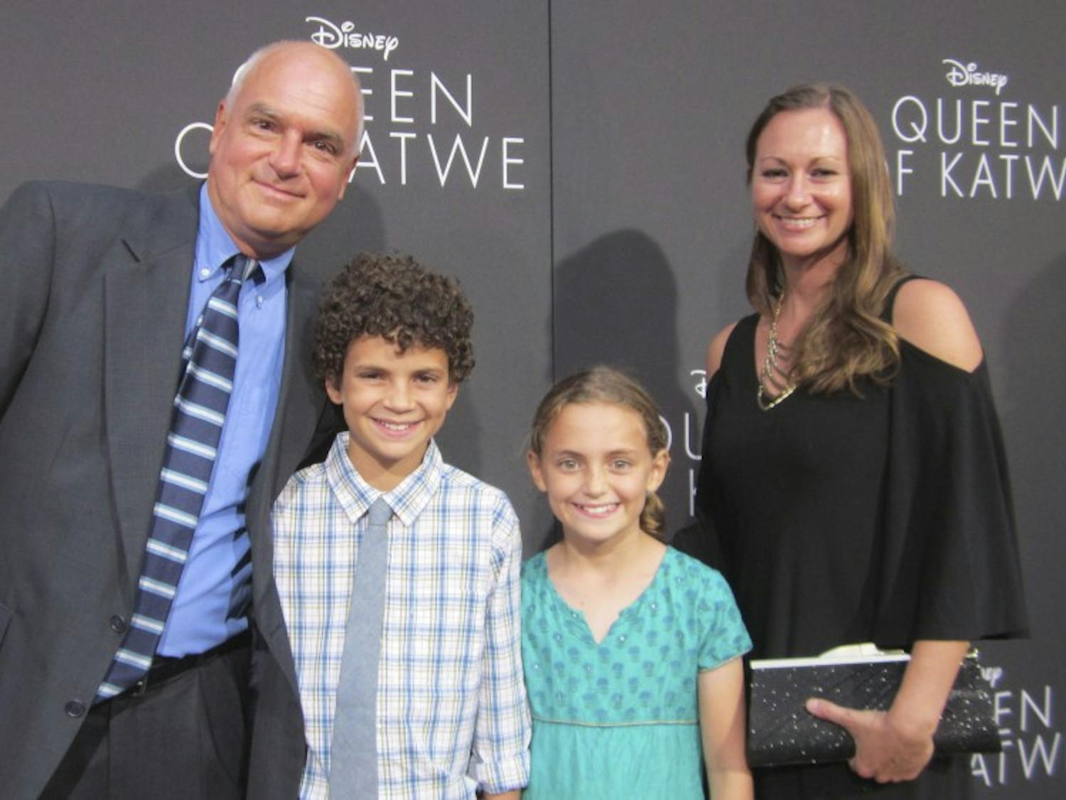 (from left)&nbsp;UNC film professor Tim Crother, his son, Atticus,&nbsp;daughter, Sawyer, and wife, Candace, pose at the premiere of the new Disney movie Queen of Katwe in Hollywood. Photo Courtesy of Tim Crother.
