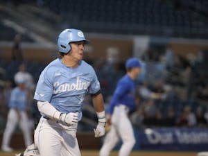 Infielder Vance Honeycutt (7) gets the first hit of the game for the Heels. The Heels lost to Duke 3-9 away on Saturday, March 19, 2022.