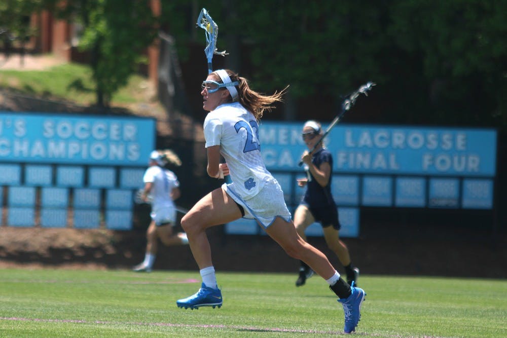 Taylor George charges toward the goal during Sunday afternoon's NCAA tournament game against Georgetown. 