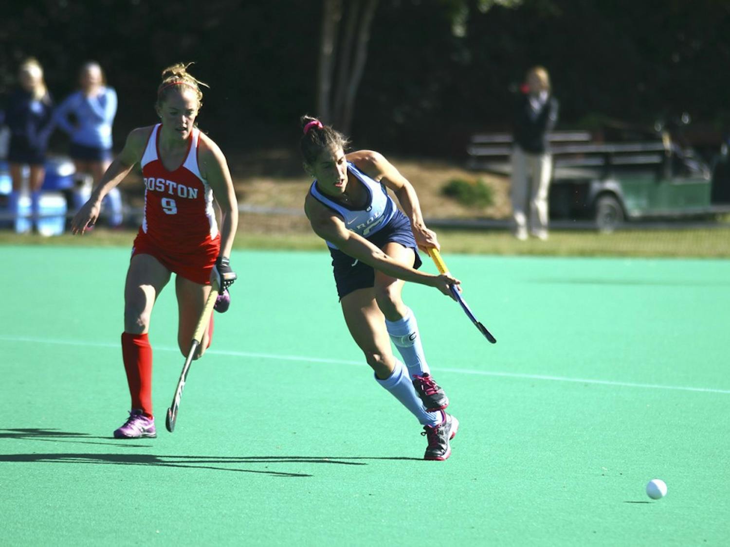 Wold, Emily passes the ball at the field hockey game against Boston University on Saturday Nov. 14 