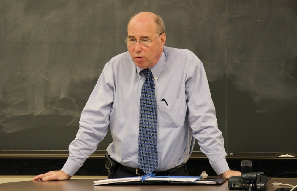 Art Pope giving a lecture to a Philosophy class on Tuesday April 9th