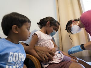 Children wait to receive their COVID-19 vaccine at the Chapel Hill Children's Clinic on June 24, 2022. The N.C. Department of Health and Human Services recently announced that COVID-19 vaccines are now available for children 6 months to 5 years old.