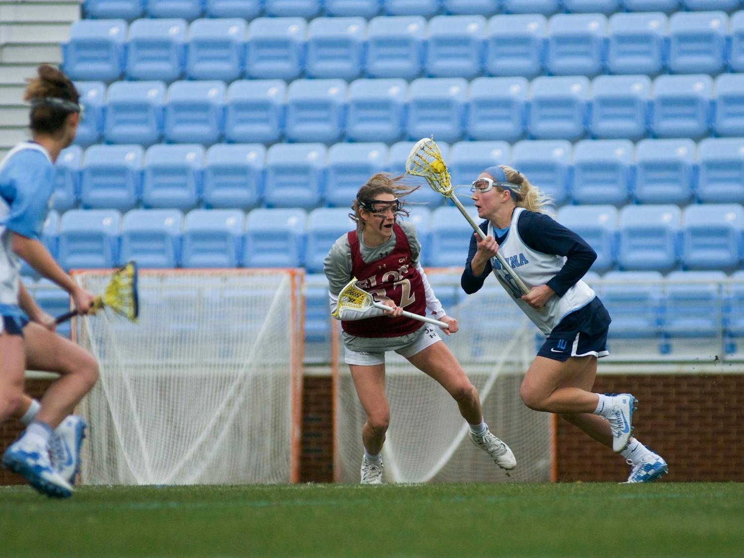 UNC Junior attacker Taylor McDaniels (10) looks for scoring opportunities. The Tar Heels won 20-3 over Elon during the exhibition match on Feb. 1, 2020, at Dorrance Field. 