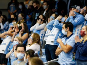 UNC fans celebrate in the Dean Dome on March 6, 2021. The Tar Heels beat the Blue Devils 91-73.