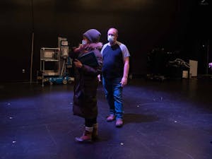Graduate student AhDream Smith discusses her vision for her upcoming play, /up-rooted/, with technician Will Bosley on Monday, Feb. 7, 2022.