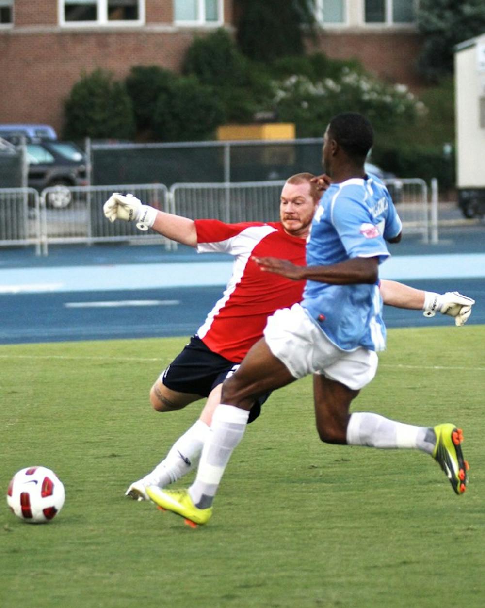 Carolina RailHawks keeper Eric Reed tried his best to keep UNC’s Alex Dixon away from the goal, but the junior had six shots and scored once.