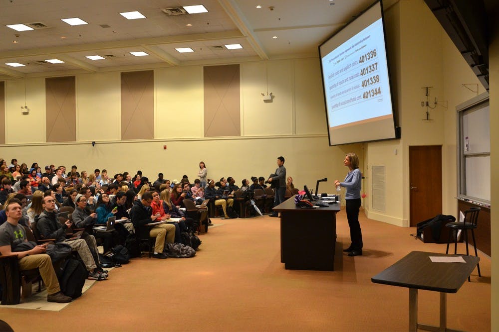 Professor Balaban uses the flipped classroom concept to teach to her Econ 101 students in Caroll Hall on March 19th. In classes that use this standard, students read their textbooks outside of class and work through problems during class time, allowing them to ask the teacher to explain concepts that are difficult to grasp.