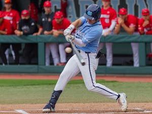 UNC redshirt sophomore outfielder Angel Zarate (40) hits the ball at the game against Louisville on Sunday May 16th, 2021 at Boshamer Stadium in Chapel Hill. The Tar Heels won 10-5.