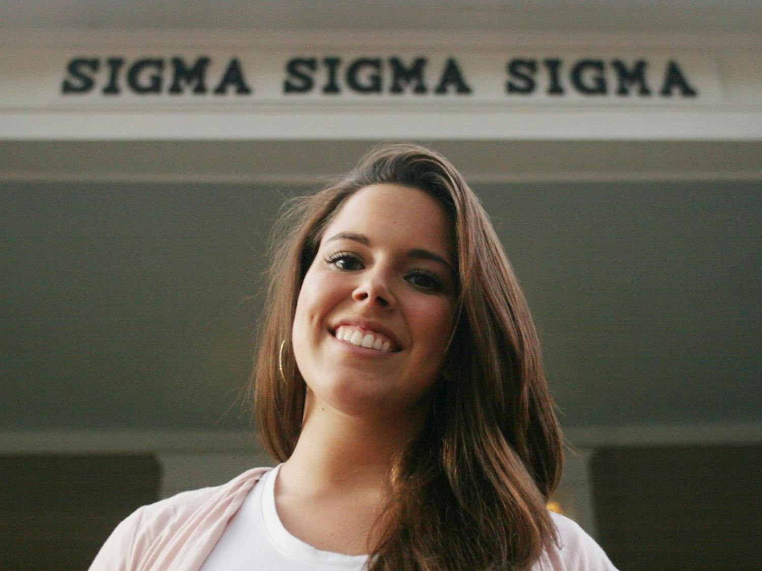 Ana Samper, a member of Sigma Sigma Sigma sorority, stands on the porch of her sorority house on Tuesday evening. Samper was elected president of the Panhellenic Council on Thursday night.