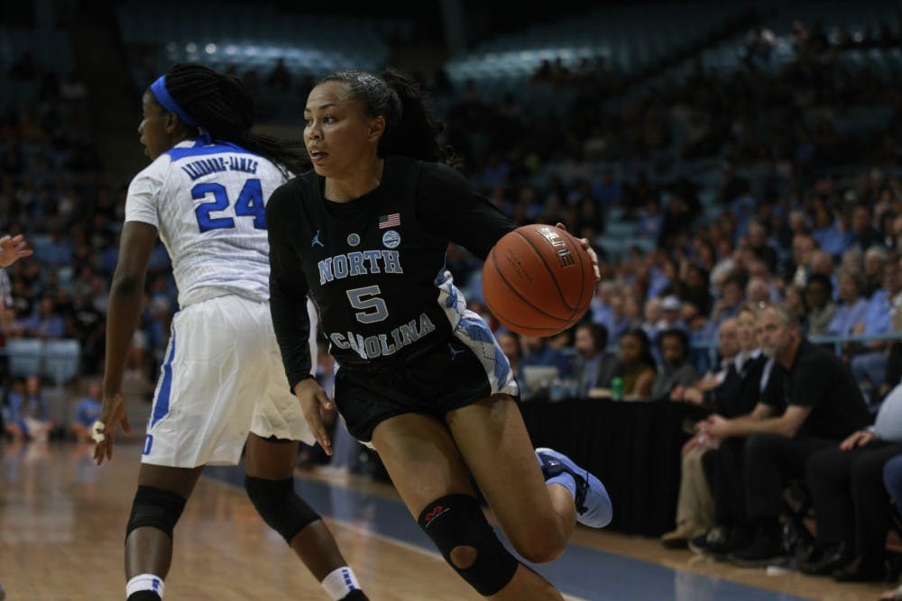 Redshirt junior Stephanie Watts (5) cuts across the court during a game against Duke in Carmichael Arena on Thursday, Feb. 7, 2019. UNC lost 69 to 85.