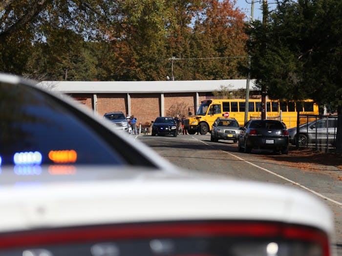 Students from Carrboro Elementary school are bused to Carrboro Town Hall, where parents could check out their kids, on Tuesday Nov. 20 after an active shooter false alarm at the school. The police found no substance to the active shooter call.&nbsp;