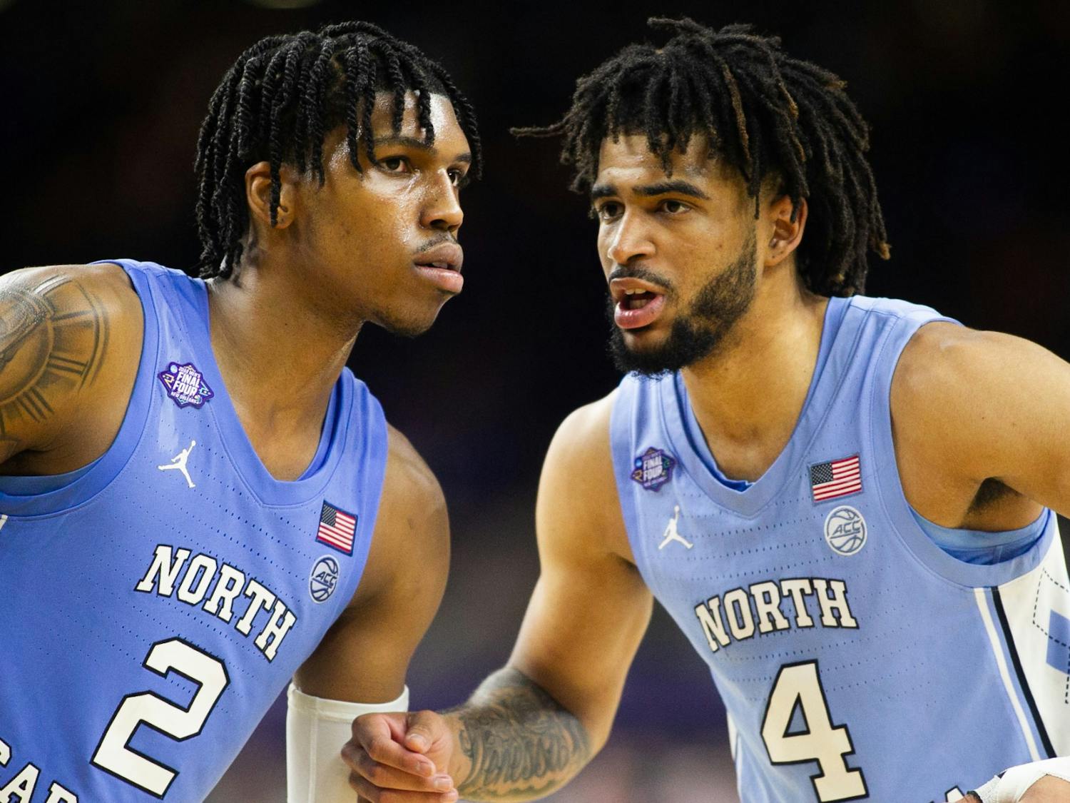 UNC sophomore guards Caleb Love (2) and RJ Davis (4) prepare for the final seconds of the Final Four of the NCAA Tournament against Duke in New Orleans on Saturday, April 2, 2022. UNC won 81-77.