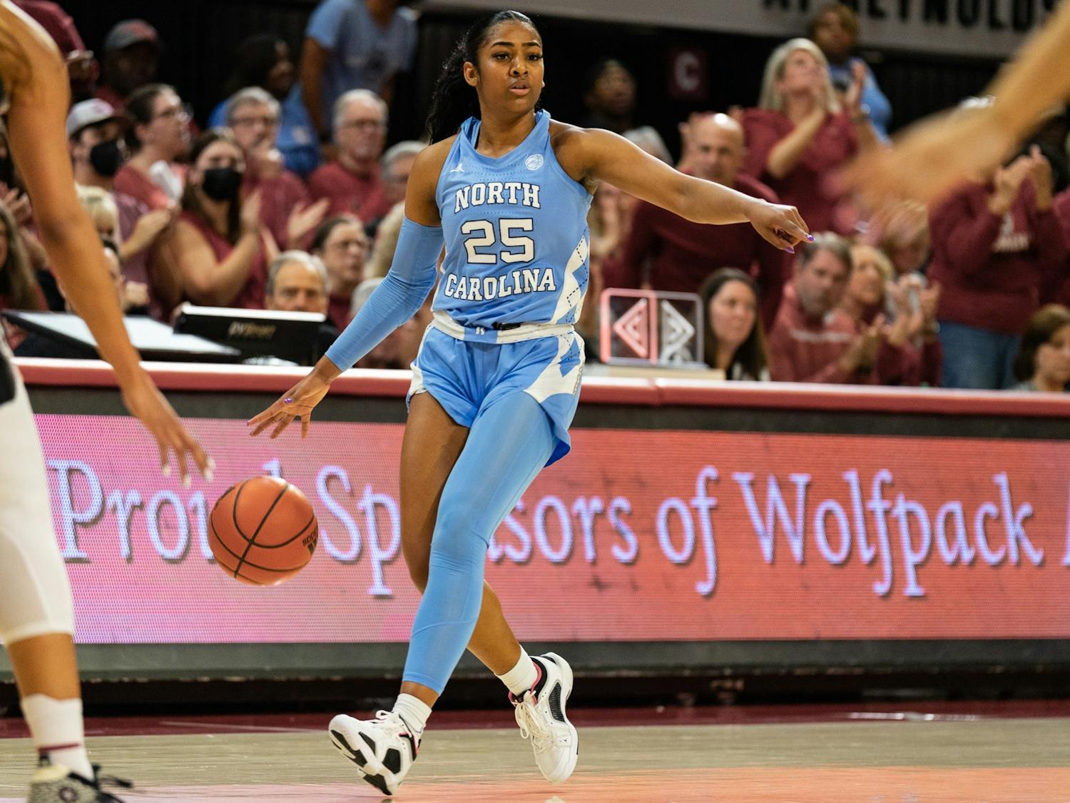 UNC junior guard Deja Kelly (25) calls a play during the women’s basketball game against NC State on Thursday, Feb. 16, 2023, at Reynolds Coliseum in Raleigh, NC. UNC fell to N.C. State 66-77.
