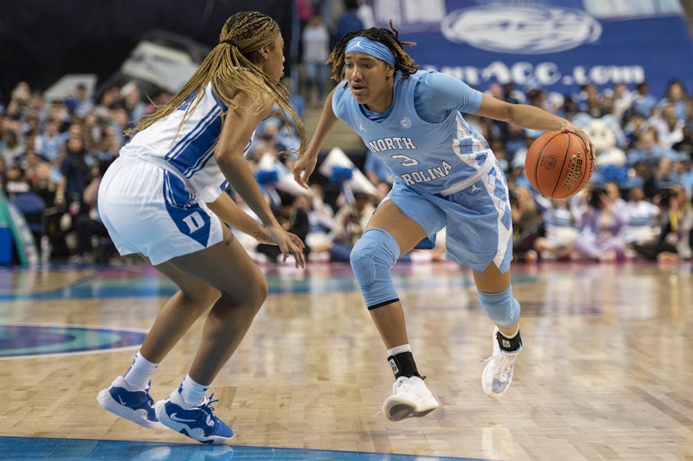 <p>Former UNC junior guard Kennedy Todd-Williams (3) moves toward the basket during the women’s basketball game in the third round of the ACC tournament in Greensboro, N.C., on Friday, March 3, 2023. UNC fell to Duke 40-44.</p>
