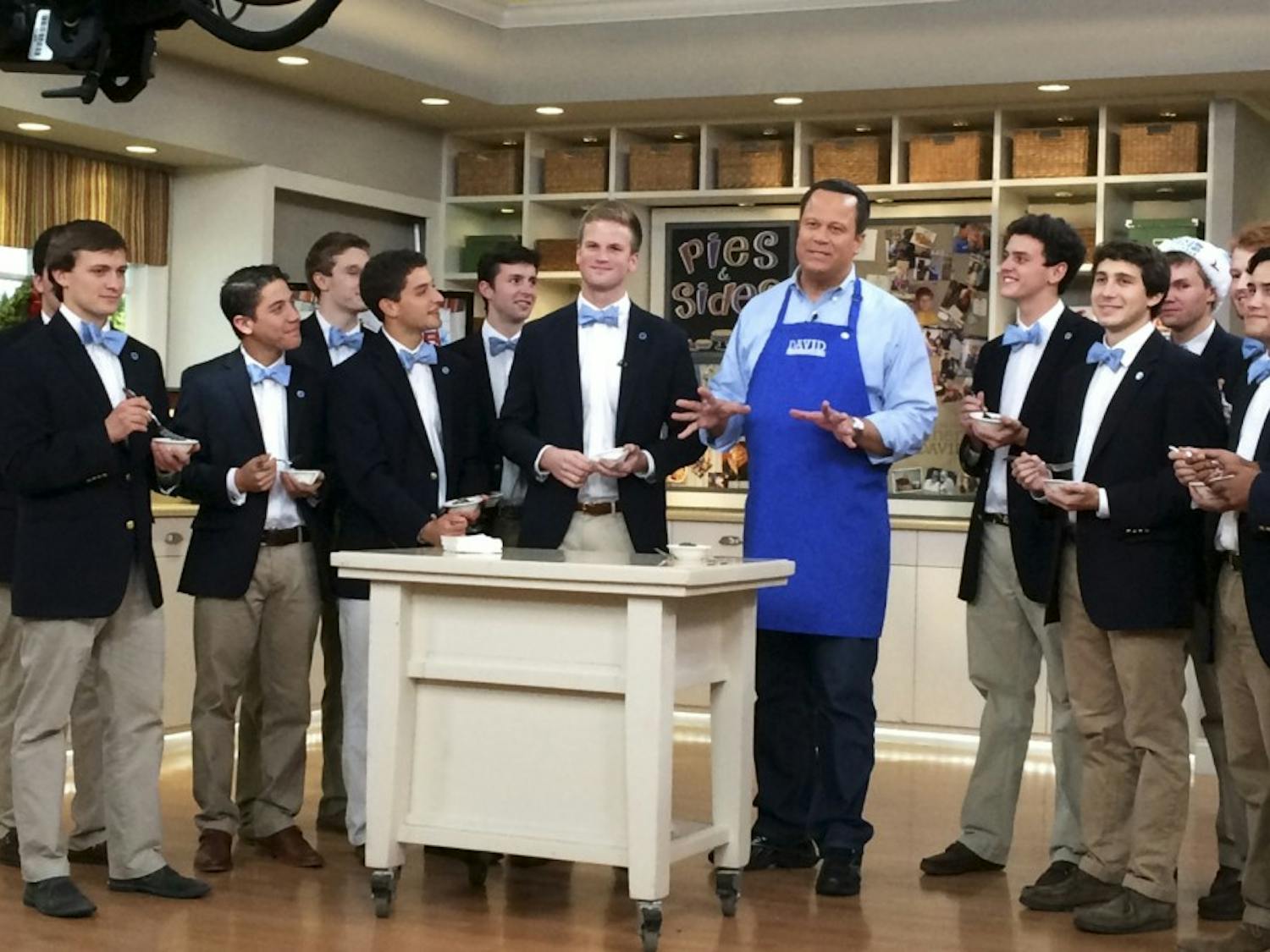 UNC’s Clef Hangers perform on the set of QVC’s “In the Kitchen with David,” hosted by former Clef Hanger David Venable. Courtesy of Channing Mitzell. 