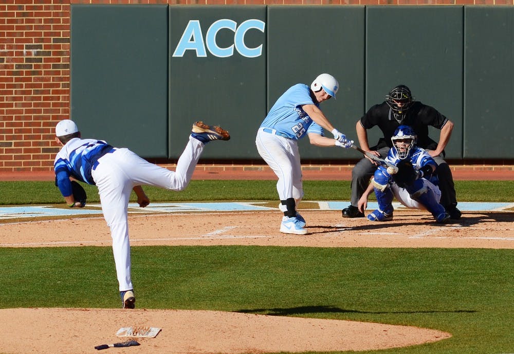 UNC first baseman Cody Stubbs (25) makes contact with the ball.