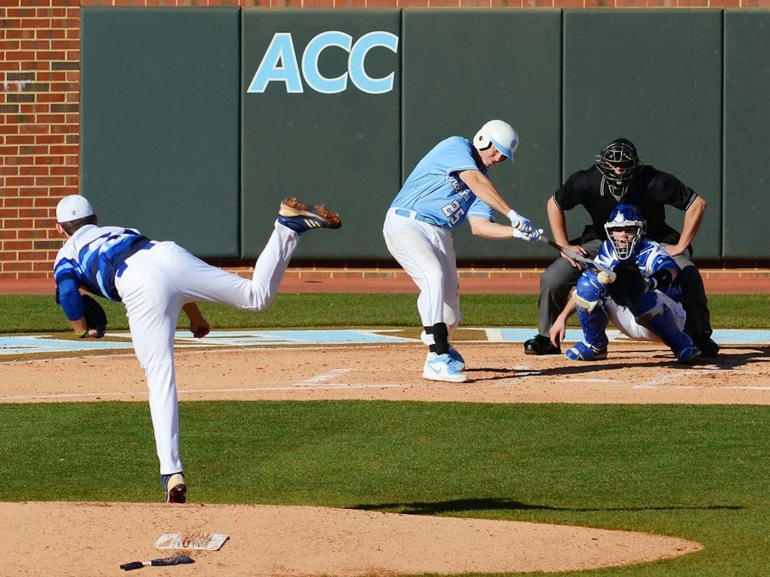UNC first baseman Cody Stubbs (25) makes contact with the ball.