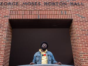 Chapel Hill’s new poet Laureate, Cortland Gilliam poses in from of George Moses Horton Residence Hall on Wednesday, January 18, 2023.