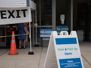 Chapel Hill Public Library is closed to the public due to COVID-19 and only operates using a drive-thru pick-up and drop-off system, as pictured here on Sept. 1, 2020.