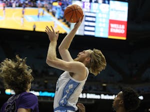 UNC graduate forward Brady Manek (45) shoots the ball during a home game at the Dean Smith Center against Furman on Tuesday, Dec. 14, 2021.