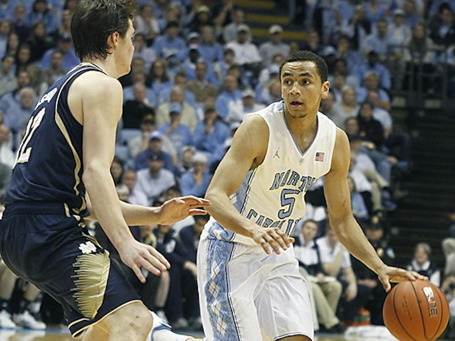 Sophomore guard Marcus Paige (5) attacks the basket against a Notre Dame player. Carolina defeated Notre Dame 63-61 on Monday in the Dean Dome. 