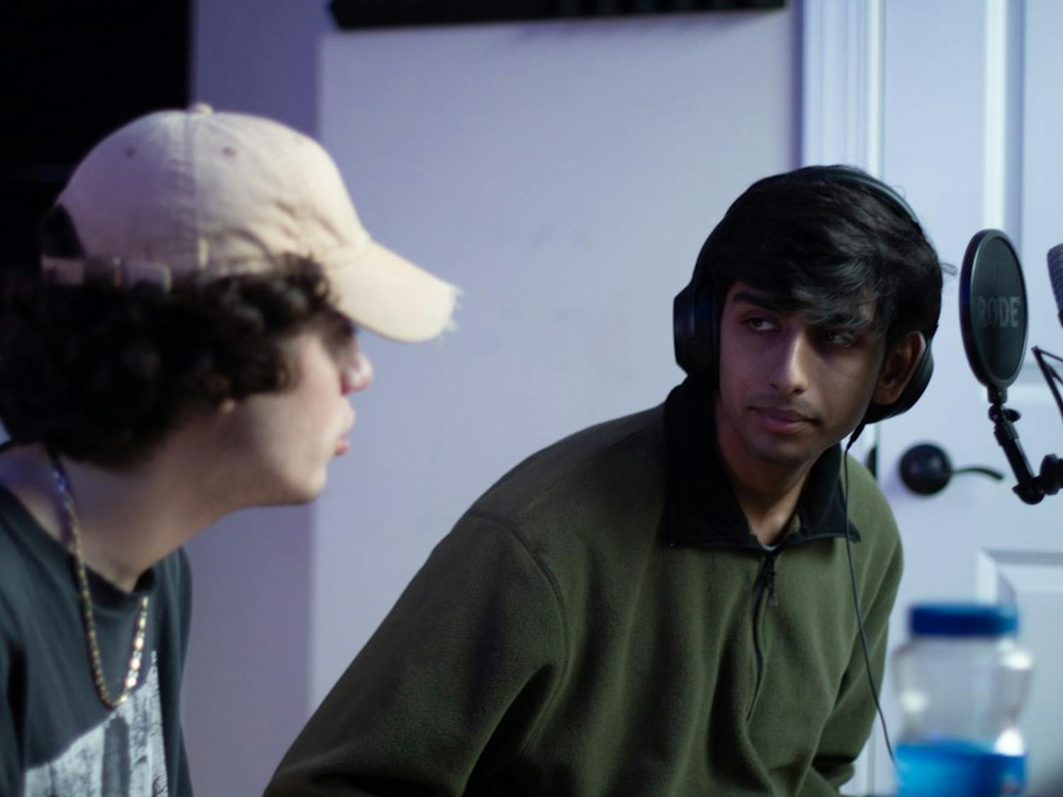 Marco Gomez and Tanmay Joshi, both 18-year-olds from Cary, discuss Weston Estate's soon-to-be-released song on Sunday, Feb. 2, 2020. The "anti-pop" band draws from idols like Frank Ocean and Clairo.