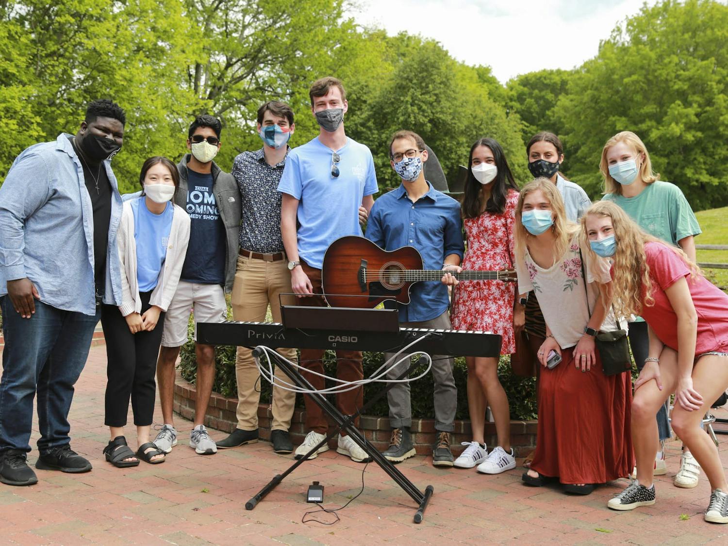 Participants of UNC Musical Empowerment's outdoor senior recital pictured last year in the Gene Stroud Community Rose Garden. Photo by Alex Berenfeld.