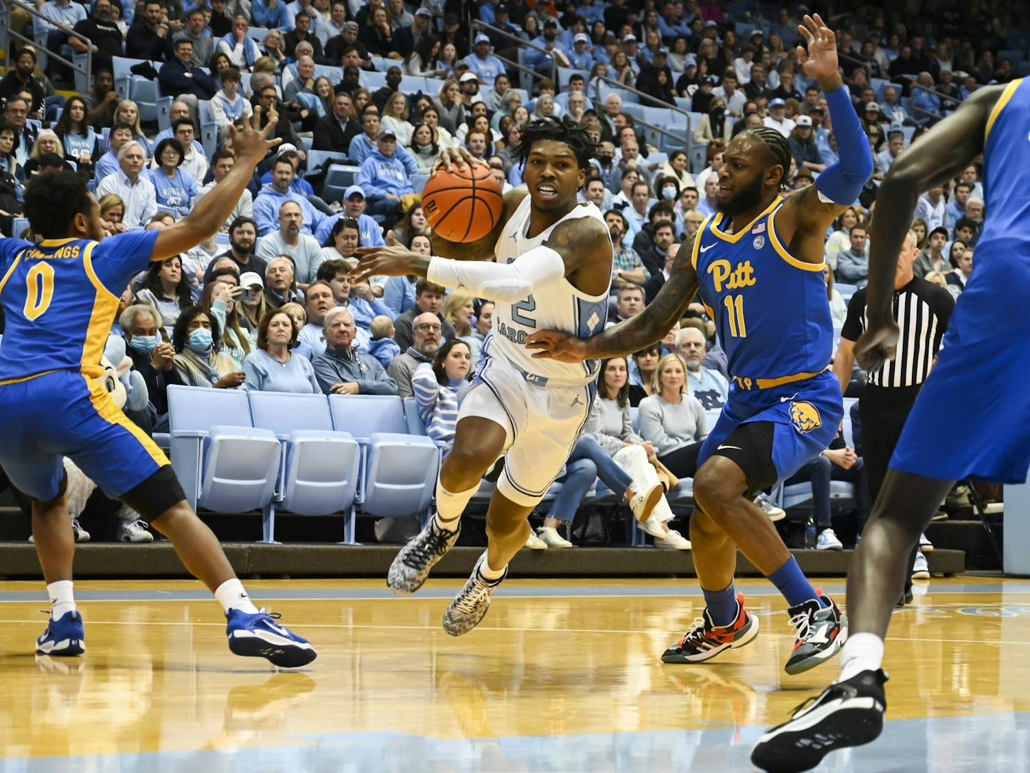 UNC junior guard Caleb Love (2) drives toward the basket during the men's basketball game against Pitt in the Dean Smith Center on Wednesday, Feb. 1, 2023. 