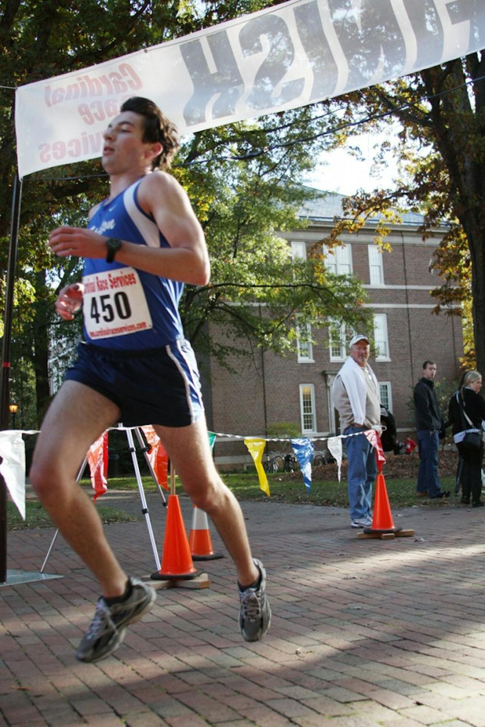 Eve Carson memorial 5K for education, Saturday 9am in front of South building. 

this guy (#450):
Jake Higdon, freshman, from Jacksonville, FL, studying Political Studies. When I asked him why he came out to race he said when he heard about it, "it sounded like an awesome cause, and I wanted the exercise."