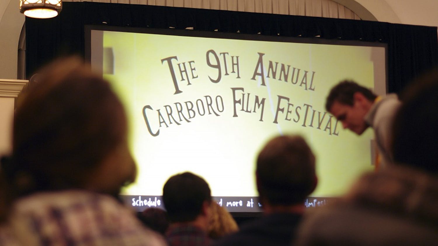 Attendees of the 9th annual Carrboro Film Festival prepare to watch a series of short films by UNC alumnus Jon Kasbe at the Carrbor Century Center on Saturday November 22. 