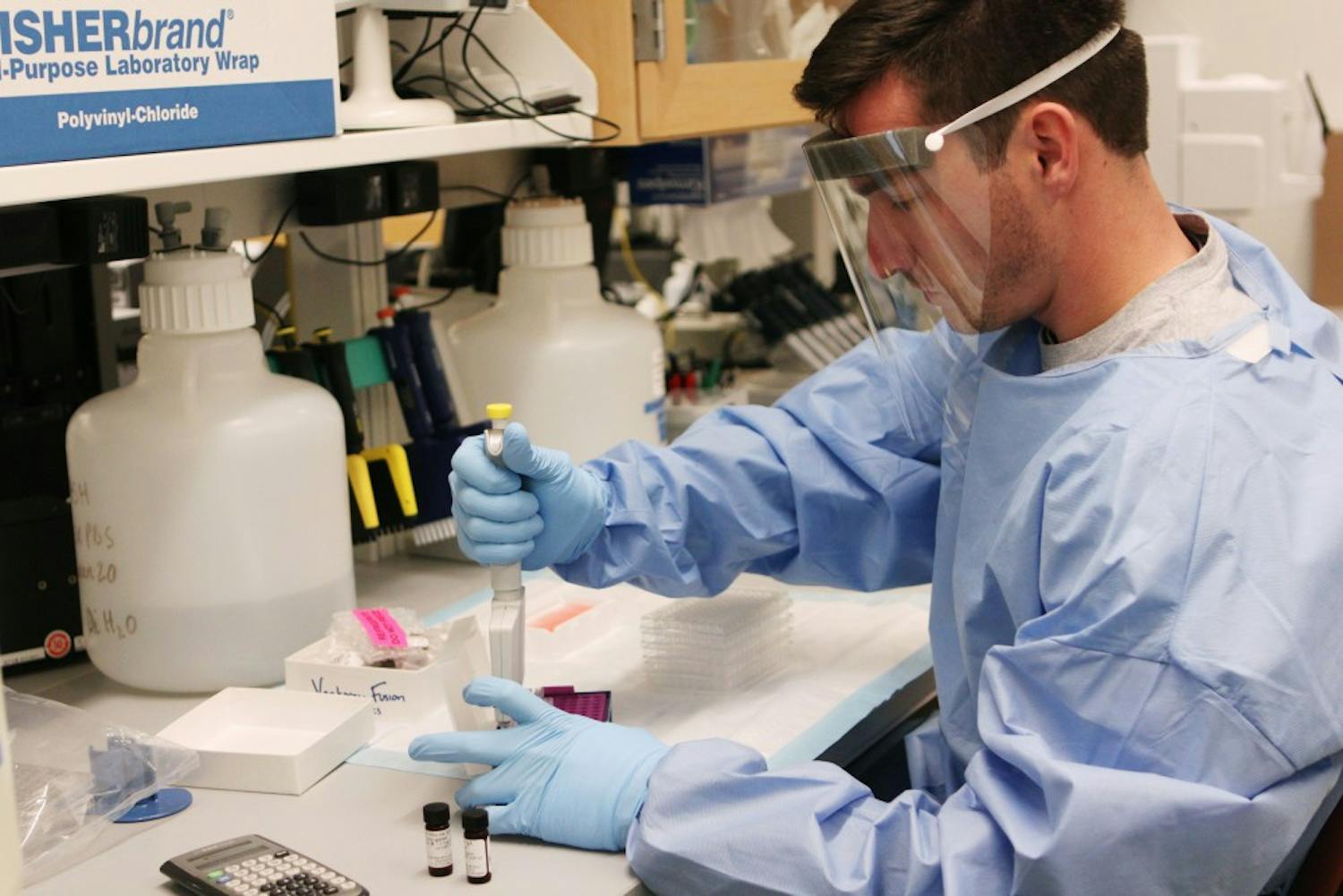 Duke has a lab that is studying HIV vaccine research, in the Duke Human Vaccine Institute. Brad Lockwood, a research analyst, works in the lab. 