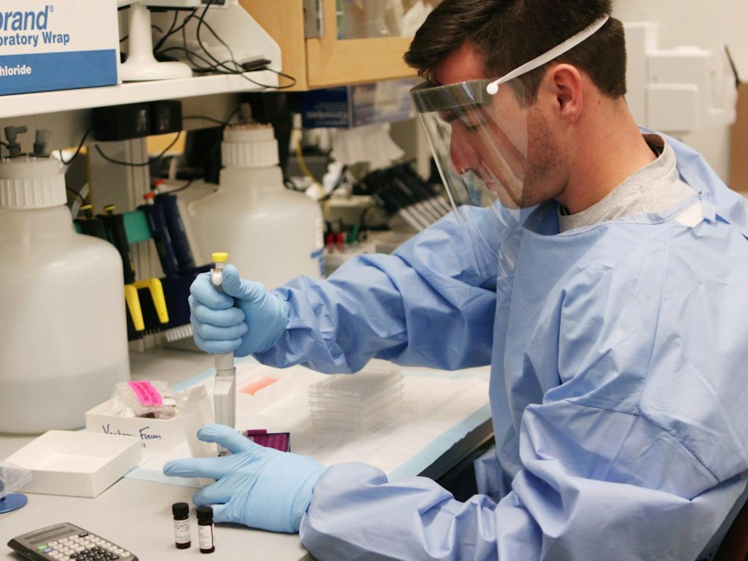 Duke has a lab that is studying HIV vaccine research, in the Duke Human Vaccine Institute. Brad Lockwood, a research analyst, works in the lab. 
