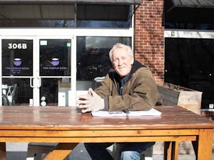 American Civil War lecturer Fred Kiger sits outside of The Purple Bowl on Franklin Street on Wednesday, Jan. 25, 2023.