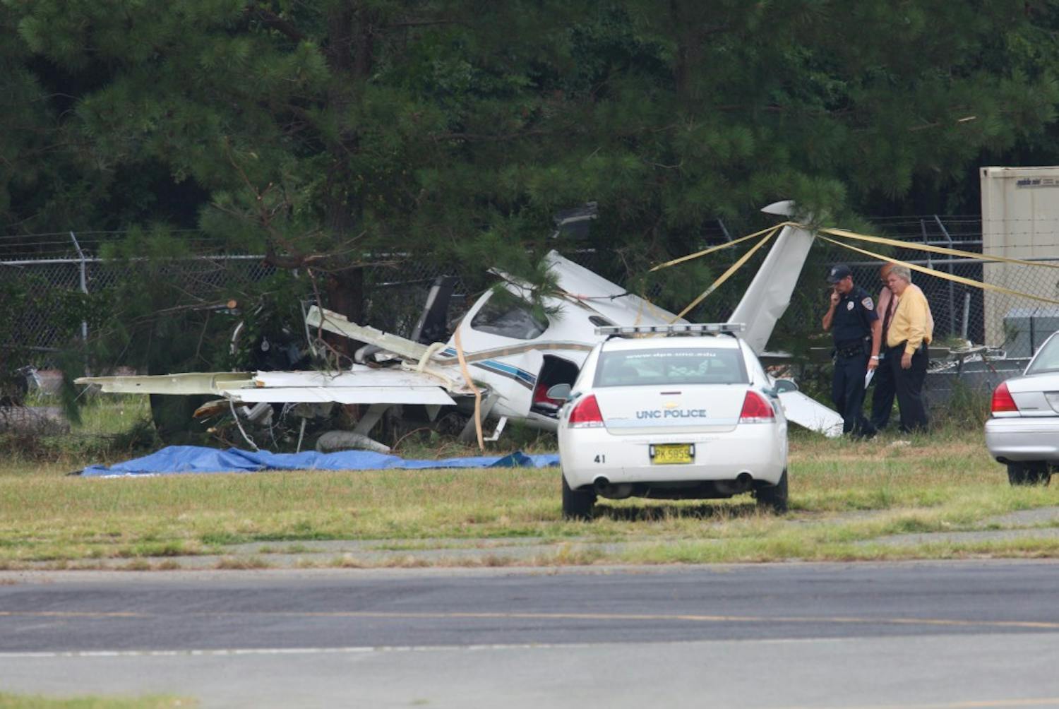 A plane crashes at the Horace Williams Airport