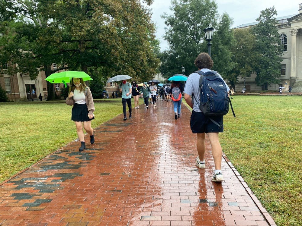 Students walk around campus in the rain on Sept. 21, 2021.