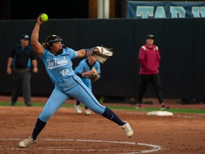 UNC senior pitcher Hannah George (42) pitches to Florida State on Friday, April 15, 2022, at Anderson Softball Stadium. Carolina fell 0-2.