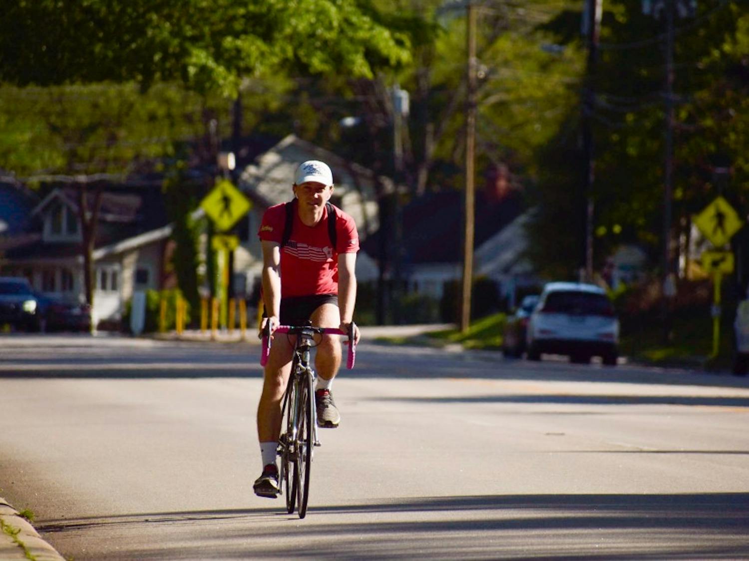 Chapel Hill residents ride their bikes on the highway as they travel from downtown to surrounding neighborhoods. 