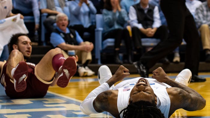 UNC junior guard Caleb Love (2) celebrates a foul during UNC's game against Boston College on Tuesday, Jan. 17, 2022. UNC won 72-64.