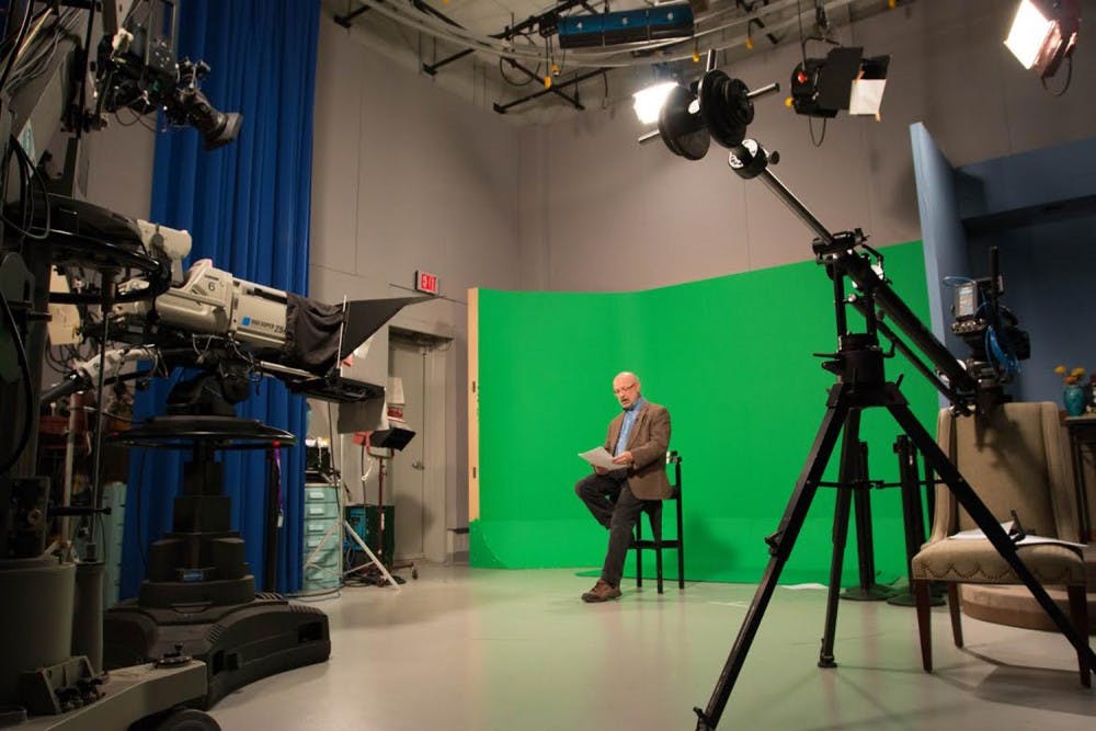 Frank Graff, a producer and reporter with UNC-TV, works on a weekly&nbsp;program called North Carolina Science Now.&nbsp;Photo courtesy of Frank Graff.&nbsp;