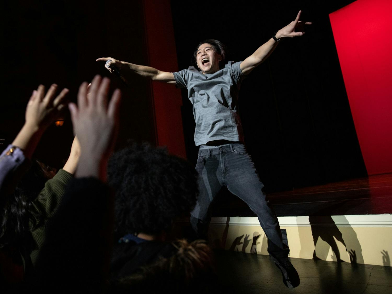 Dan Matthews, a Los Angeles-based rapper who goes by the moniker Danakadan, hypes up a crowd at Journey Into Asia at Memorial Hall on Feb. 29, 2020. Matthews performed songs that spoke to his Asian American identity as a Korean adoptee.