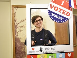English and religious studies major Josh Pontillo poses for a picture after casting his vote at the Chapel of the Cross church at 304 E. Franklin St. on Oct. 23, 2018. The Chapel of the Cross severs as an early voter location close to the University of North Carolina at Chapel Hill's campus. 